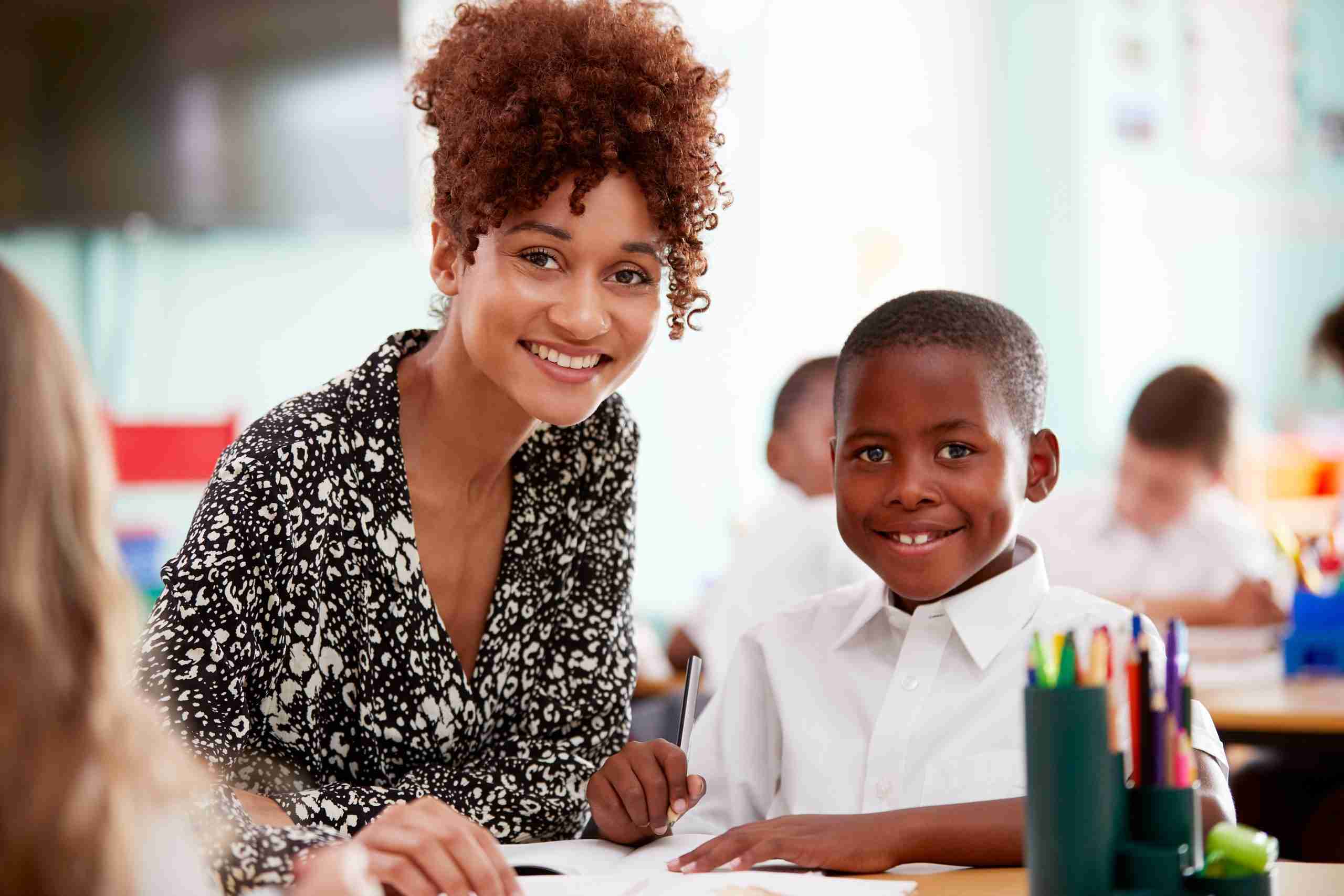 Teacher Reviewing Ineffective Intervention Practices teacher analyzing student data to identify gaps in reading intervention practices