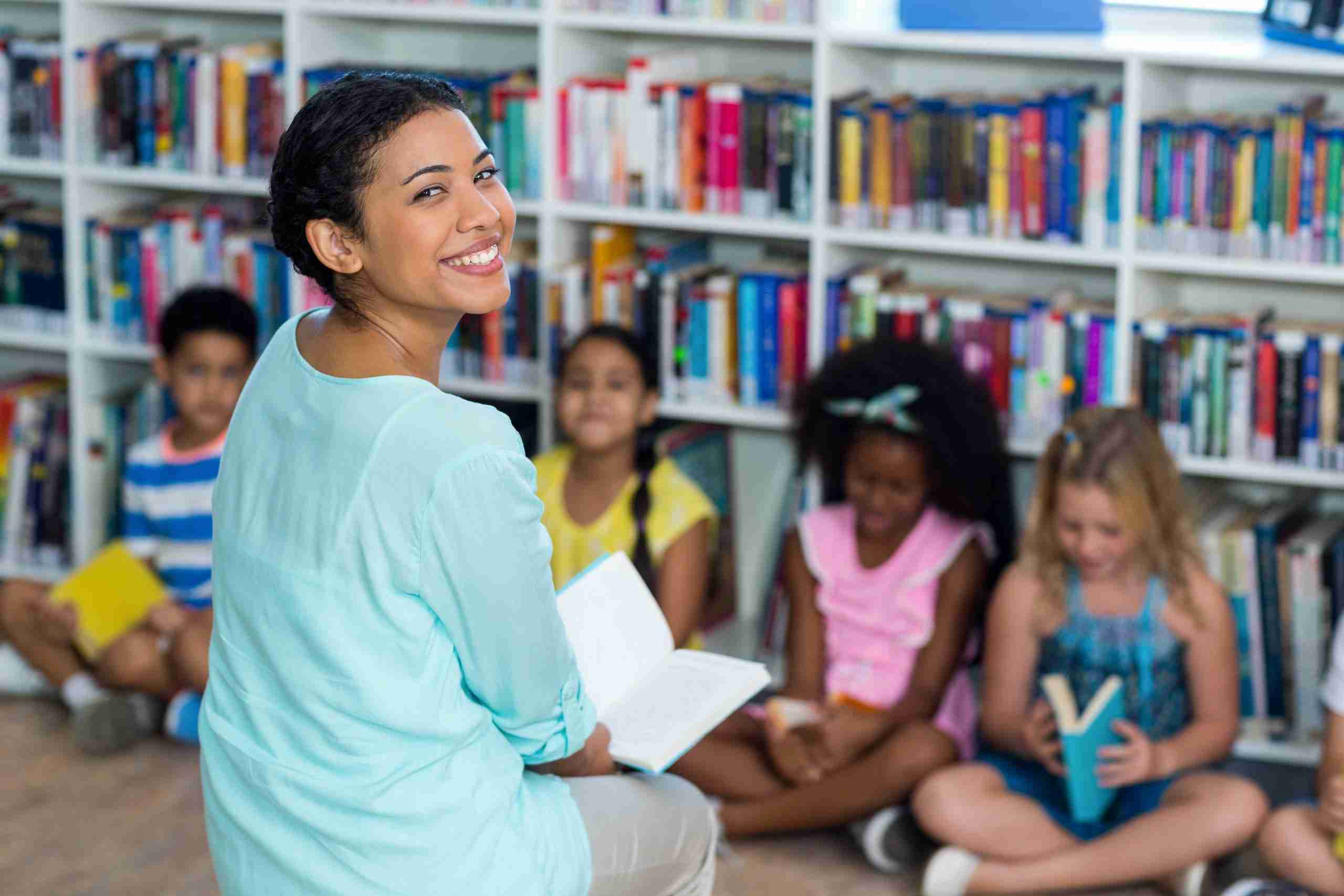 Teacher challenging advanced readers during discussion